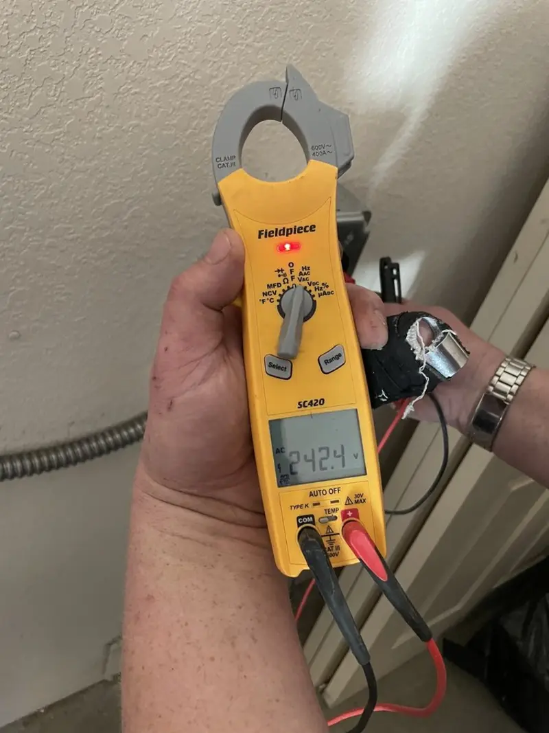 Voltage testing with clamp meter during Aluminum Wiring Replacement in Stevensville
